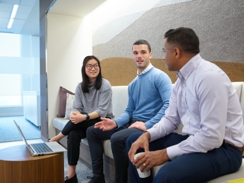 Group of LMI employees meeting in Boston offices